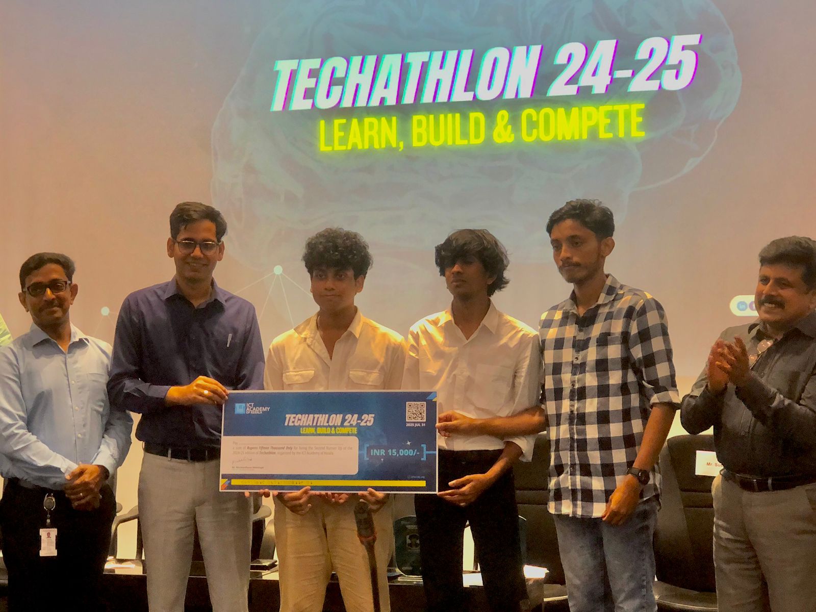 Team Rizzler receiving the award at ICTAK Techathlon 2024-25